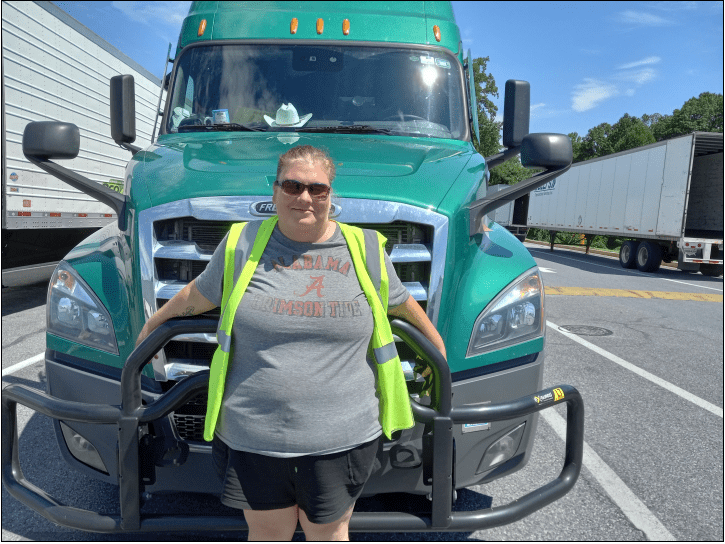 Woman truck driver takes home Prime truck and accessories